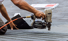 Roofers working